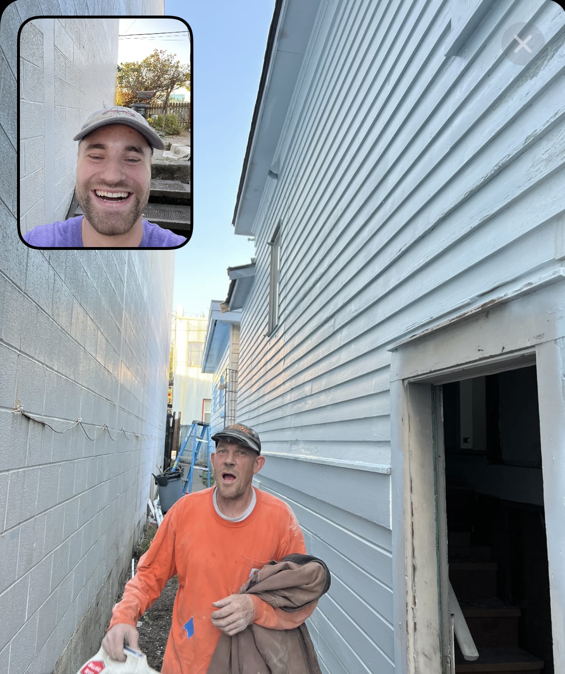 Dave, master carpenter, wearing orange on a residential jobsite